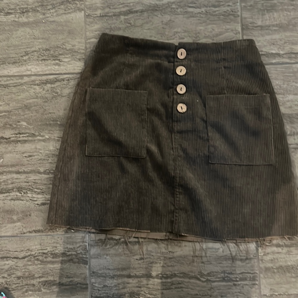 green button skirt